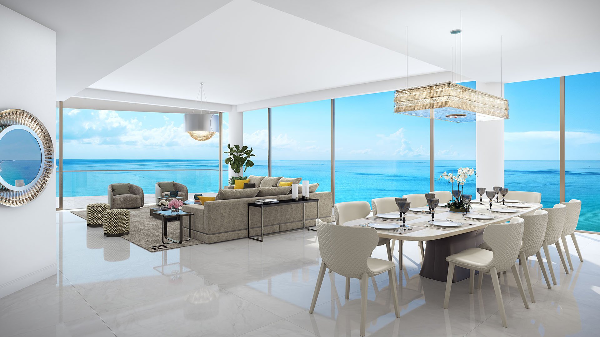 Open-concept dining and living room with panoramic ocean views and bright modern seating at The Estates at Acqualina, Sunny Isles Beach, a community of luxury and ultra luxury condos.
