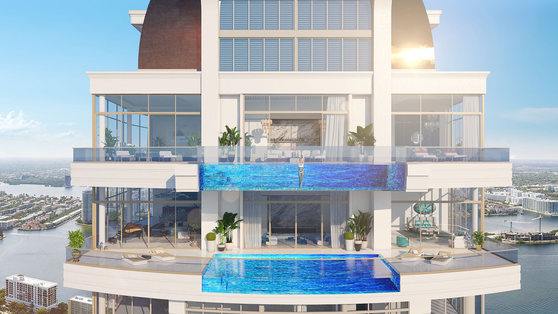 Stacked sky pools on a penthouse facade with expansive glass terraces at The Estates at Acqualina, Sunny Isles Beach, a community of luxury and ultra luxury condos.