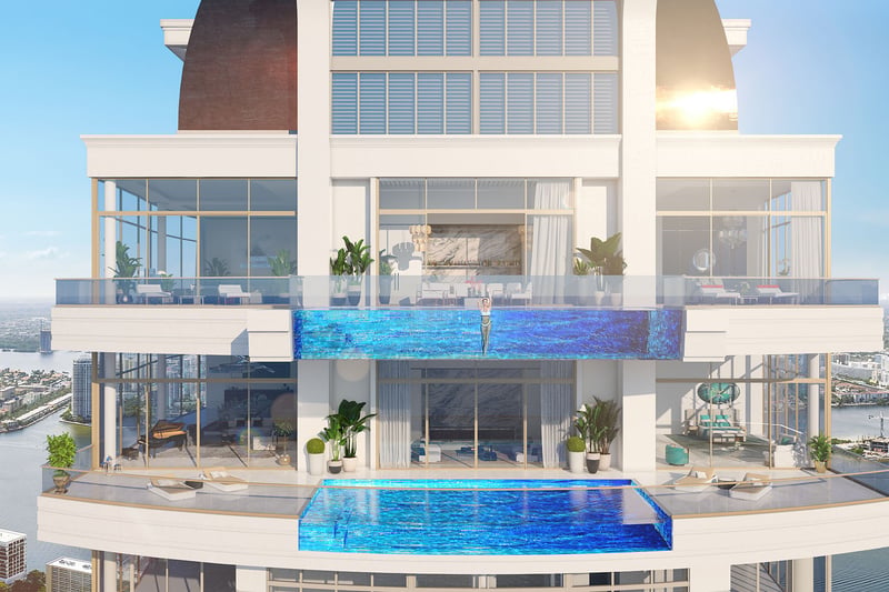 Stacked sky pools on a penthouse facade with expansive glass terraces at The Estates at Acqualina, Sunny Isles Beach, a community of luxury and ultra luxury condos.