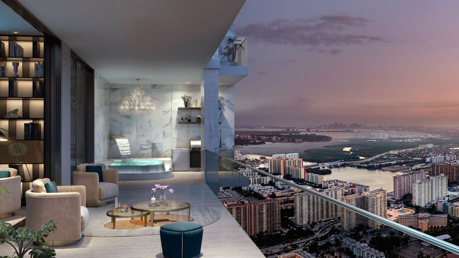Sunset skyline terrace lounge with seating, a spa tub, and wide city views at The Estates at Acqualina, Sunny Isles Beach, a community of luxury and ultra luxury condos.