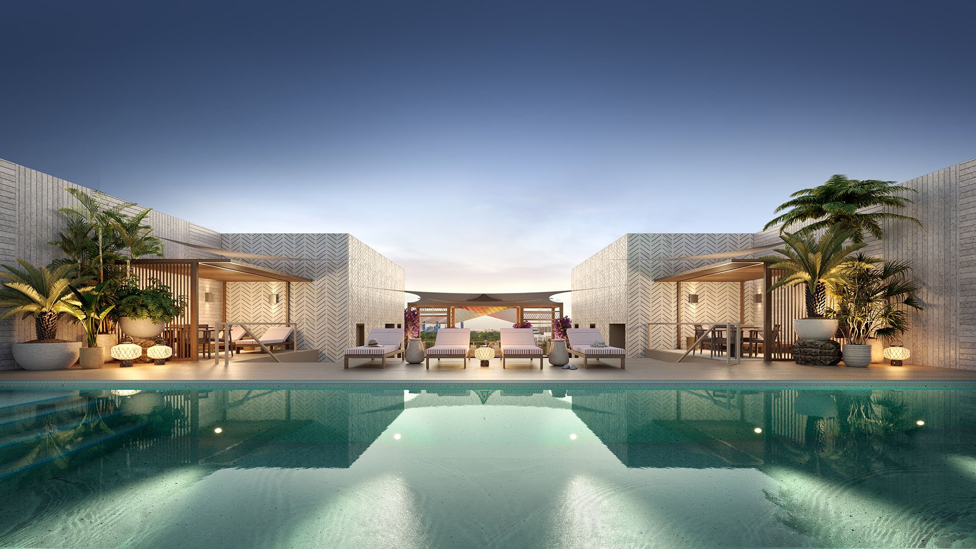 Rooftop pool at The Lincoln Coconut Grove, Miami, Florida at dusk with cabanas, sundeck loungers and soft ambient lighting, showcasing luxury and ultra luxury preconstruction condos amenities with resort-style poolscape, tropical planters and evening relaxation.