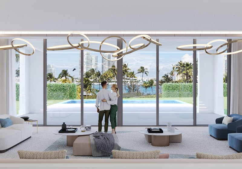 The Links Estates, Fisher Island, Miami Beach, Florida symmetrical living room panorama with glass wall, pool, palm trees and Miami skyline view, showcasing luxury and ultra luxury preconstruction condos.