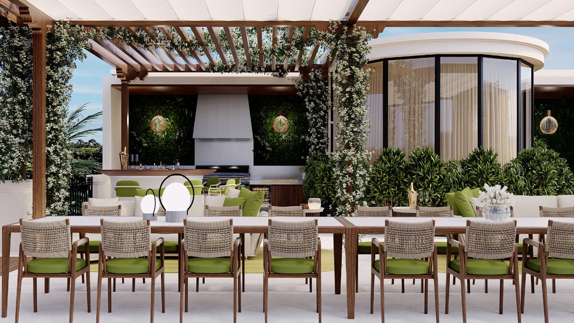 Day outdoor dining terrace at The Links Estates, Fisher Island, Miami Beach, Florida, featuring pergola shade, long table with green cushions, outdoor kitchen grill and bar, and curved glass pavilion - luxury and ultra luxury preconstruction condos.