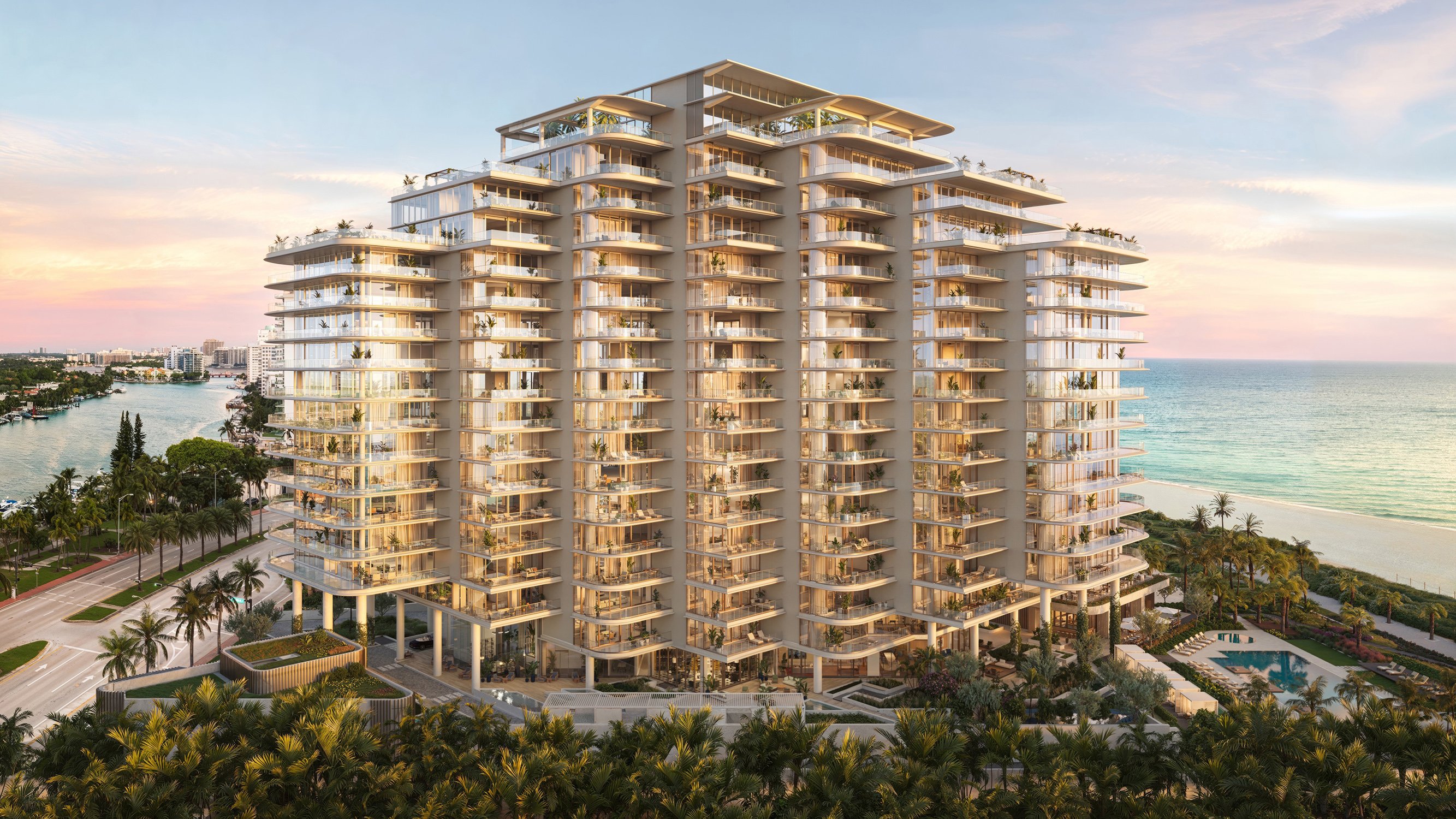 The Perigon Miami Beach oceanfront condo at sunset, glass tower over the Atlantic. Miami Beach luxury and ultra luxury condos, preconstruction.
