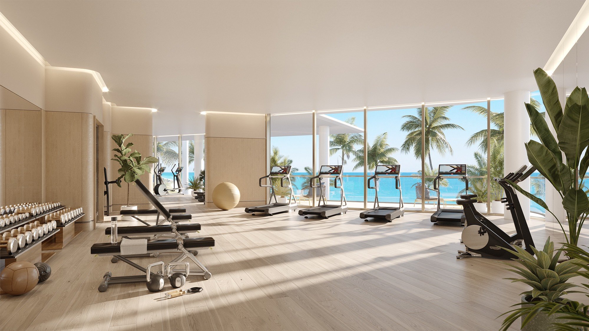 The Perigon Miami Beach modern gym with ocean view. Miami Beach wellness amenity for luxury and ultra luxury condos, preconstruction.