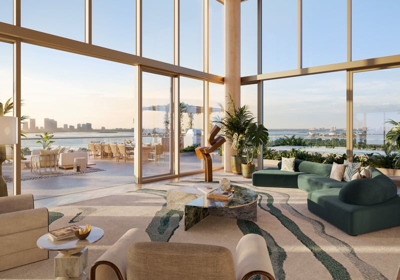 The Perigon Miami Beach living room with waterfront view and terrace. Miami Beach luxury and ultra luxury condos, preconstruction. Featuring modern interior.