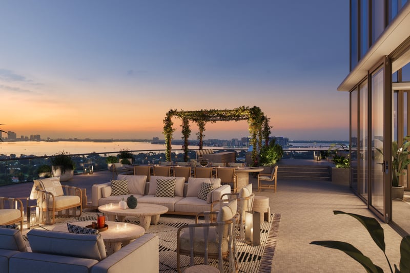 The Perigon Miami Beach rooftop lounge at sunset, skyline and ocean vistas for luxury and ultra luxury condos; preconstruction. Featuring view.