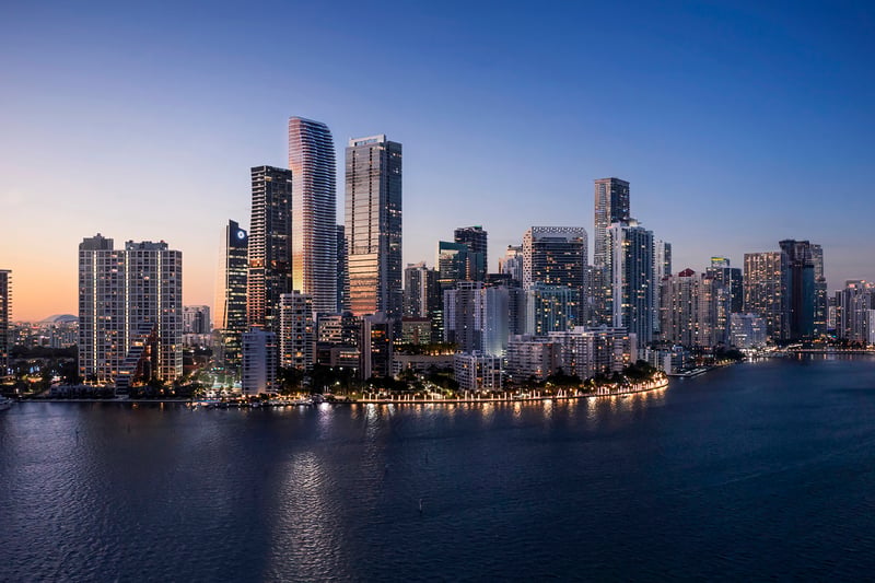 The Residences at 1428 Brickell dusk skyline view over Biscayne Bay. Brickell, Miami; landmark for luxury and ultra luxury condos, preconstruction.