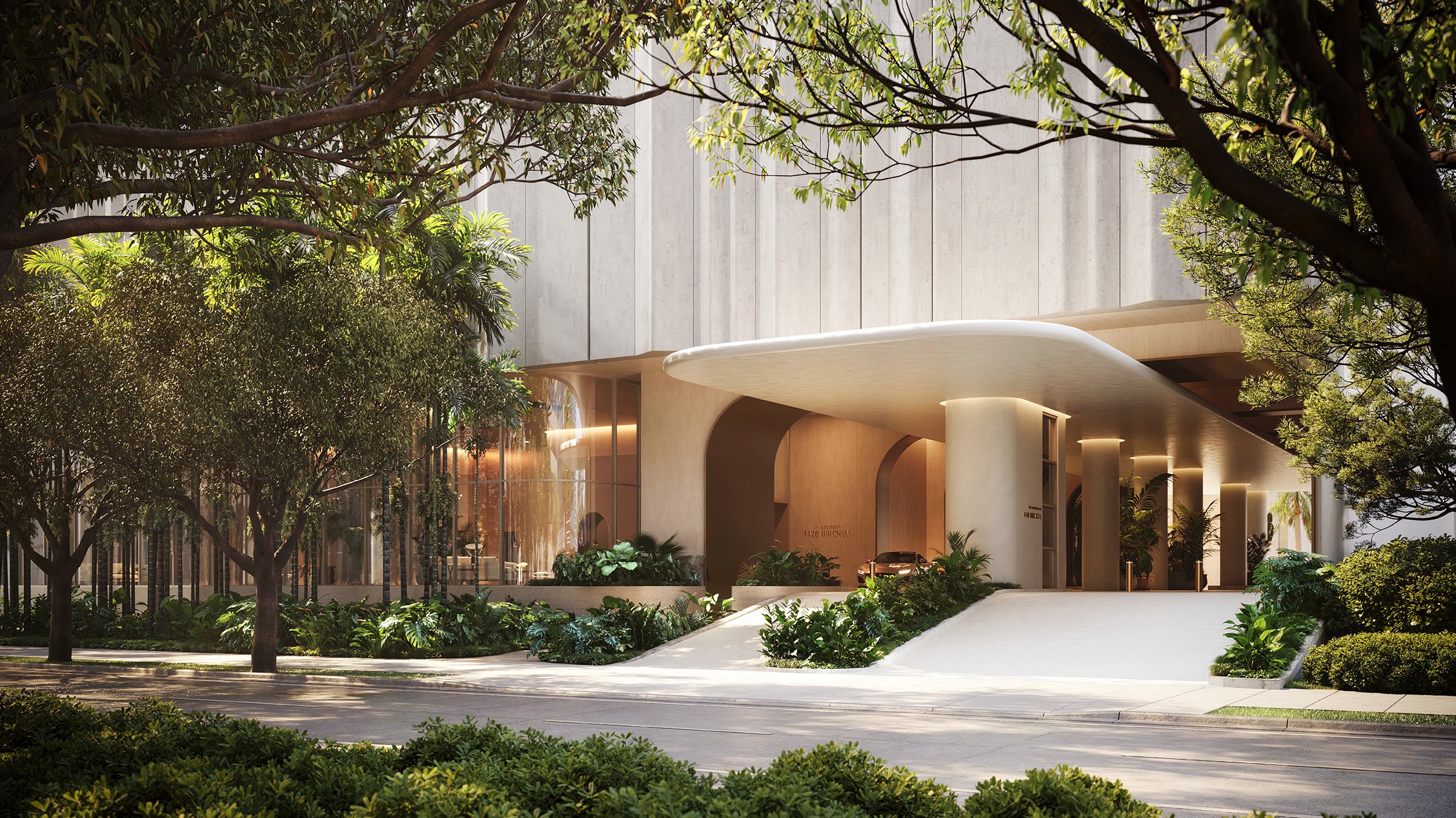 The Residences at 1428 Brickell landscaped entrance with greenery. Brickell, Miami; refined arrival for luxury and ultra luxury condos, preconstruction. Featuring modern and architectural.