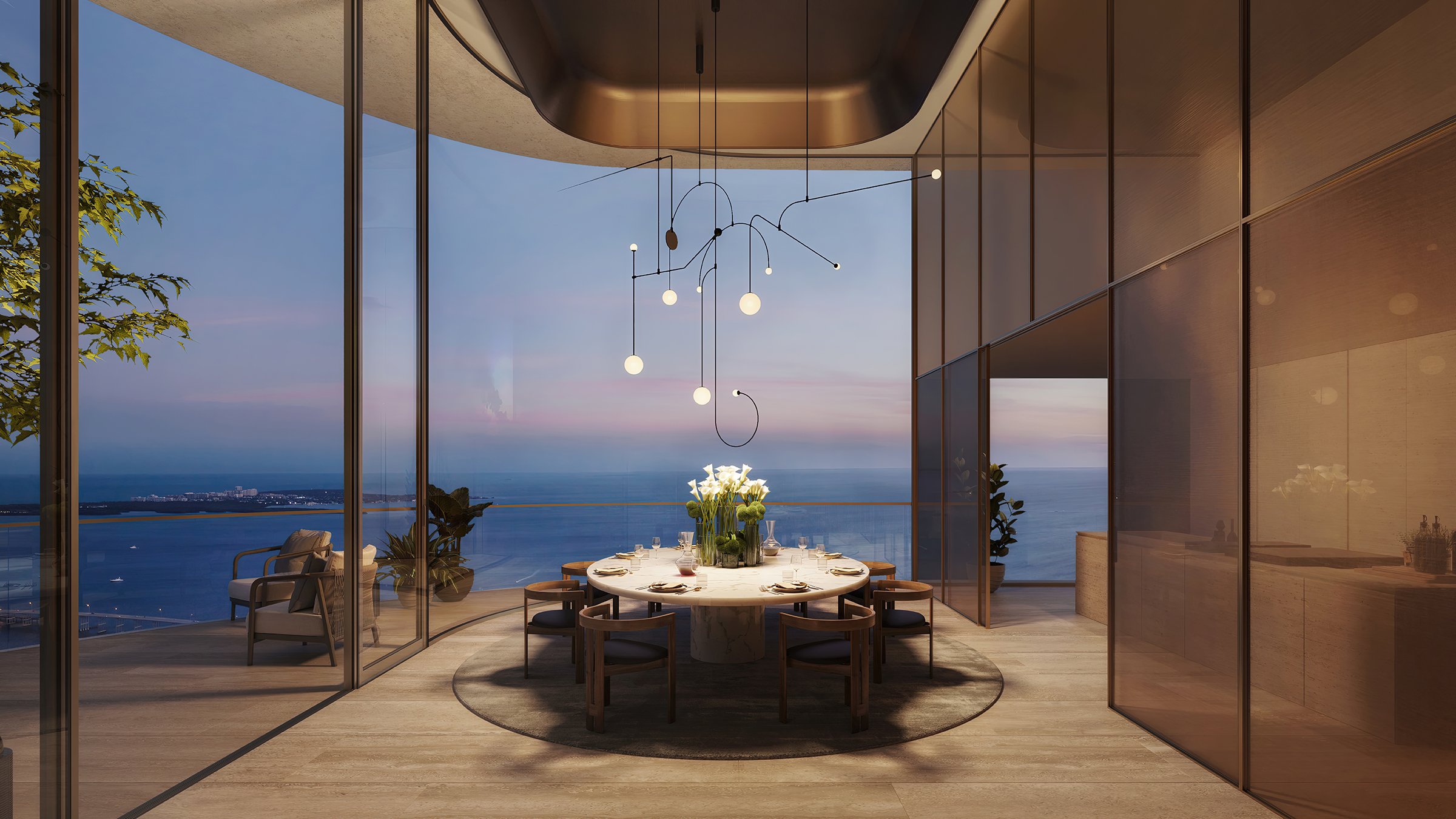 The Residences at 1428 Brickell dining room facing the ocean. Brickell, Miami; indoor‑outdoor flow for luxury and ultra luxury condos, preconstruction. Featuring modern and view.