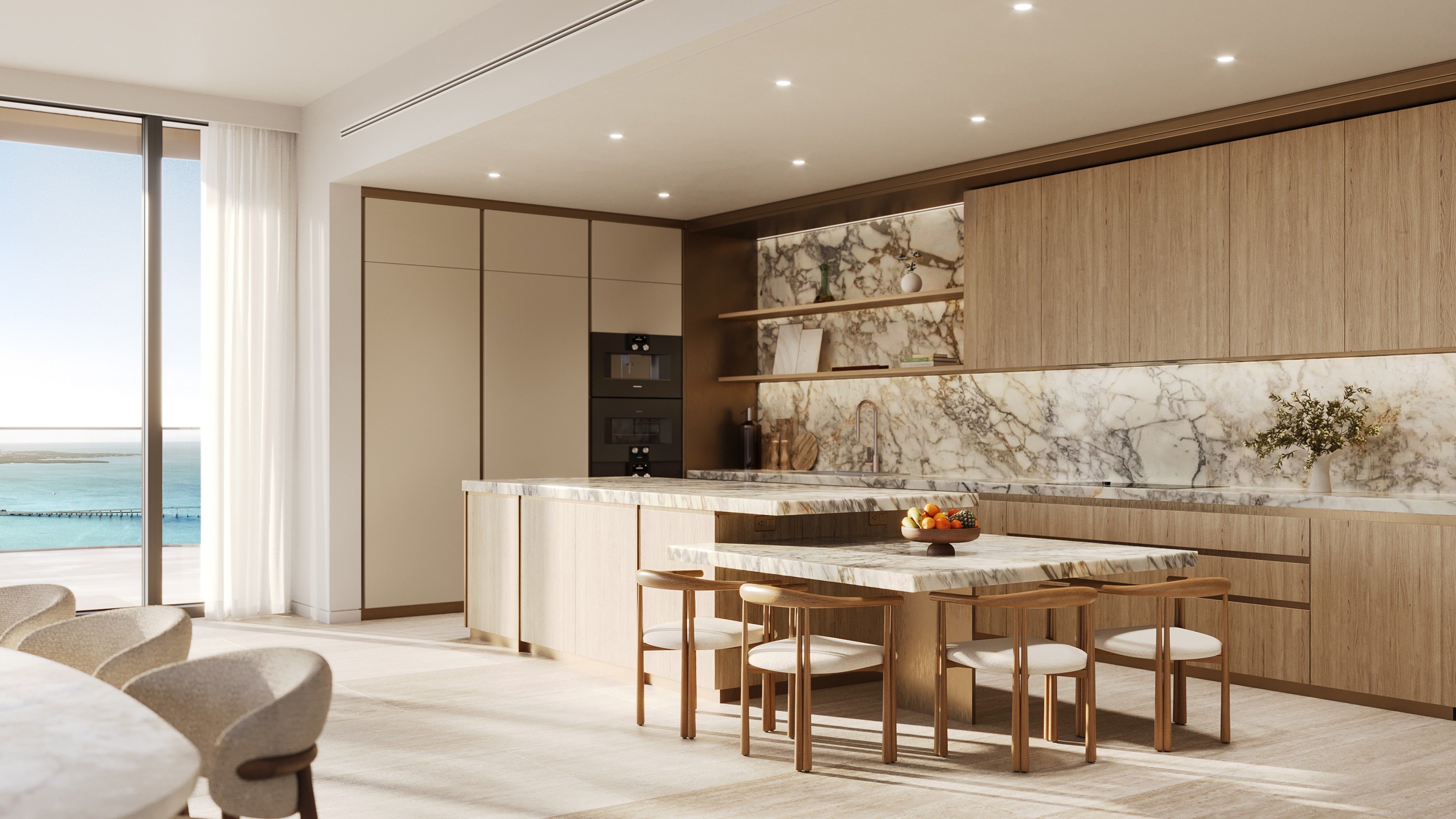 The Residences at Mandarin Oriental, Brickell Key Miami kitchen with ocean view, chef‑ready design in luxury and ultra luxury condos; preconstruction. Featuring modern interior.