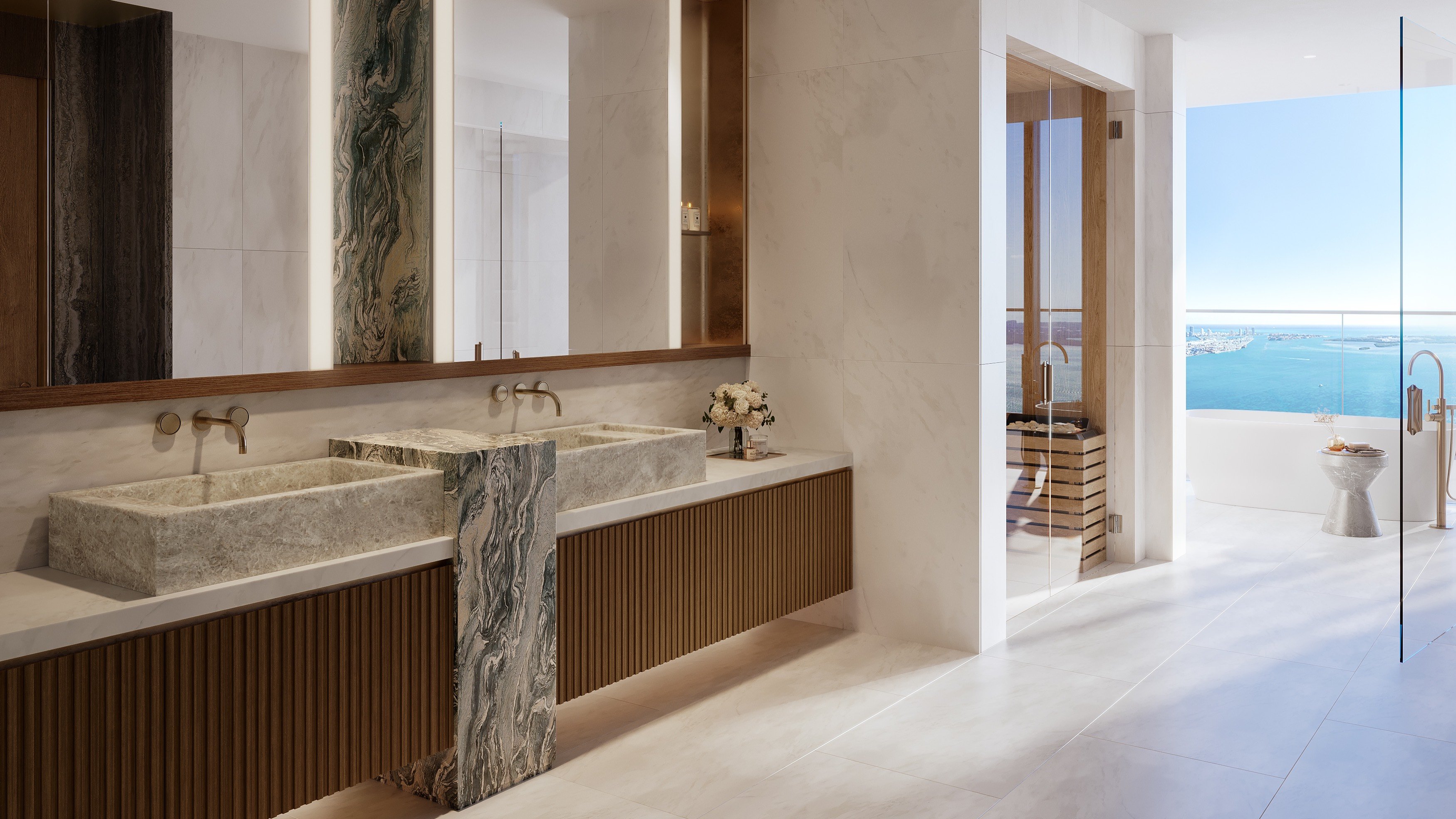 Spa-like bathroom with ocean view at The Residences at Mandarin Oriental, Miami Tower Two; luxury interiors for ultra luxury preconstruction condos in Miami. Featuring luxurious.