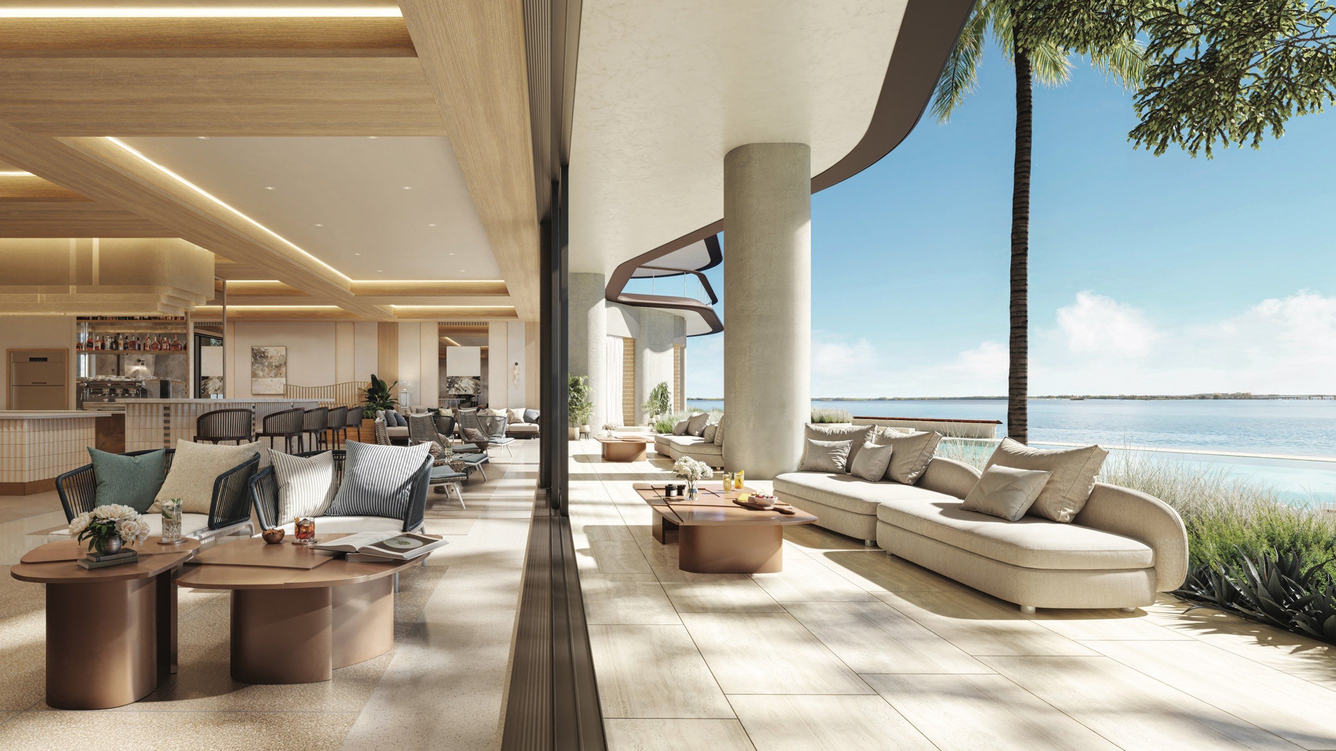 Waterfront lounge with skyline views at The Residences at Mandarin Oriental, Miami Tower Two; luxury amenity for ultra luxury preconstruction condos in Miami. Featuring view.