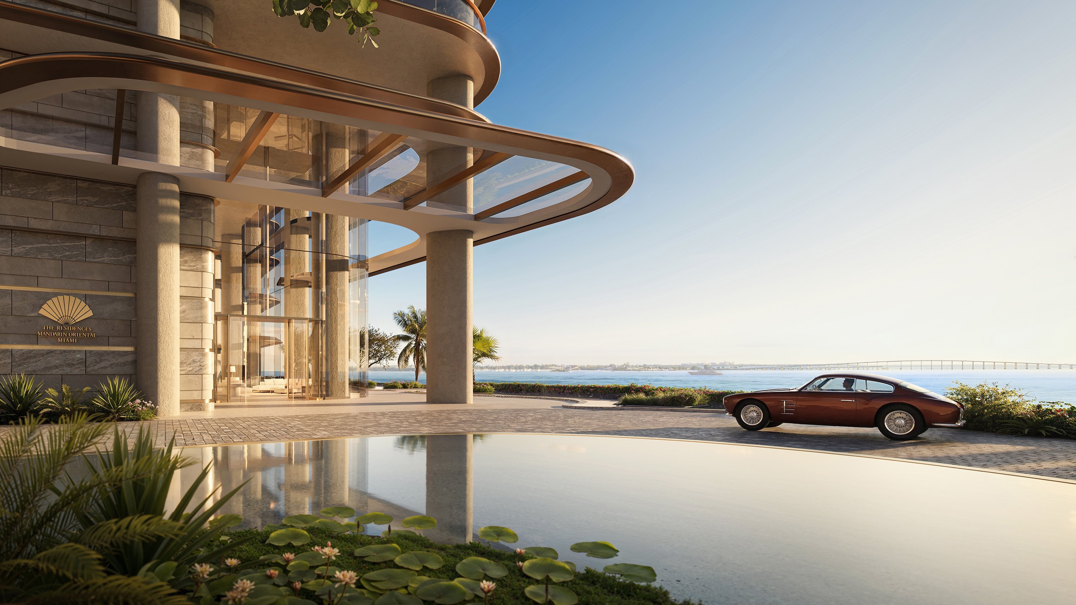 Exterior view of The Residences at Mandarin Oriental, Miami Tower Two; luxury architecture for ultra luxury preconstruction condos on the Miami waterfront. Featuring residence.