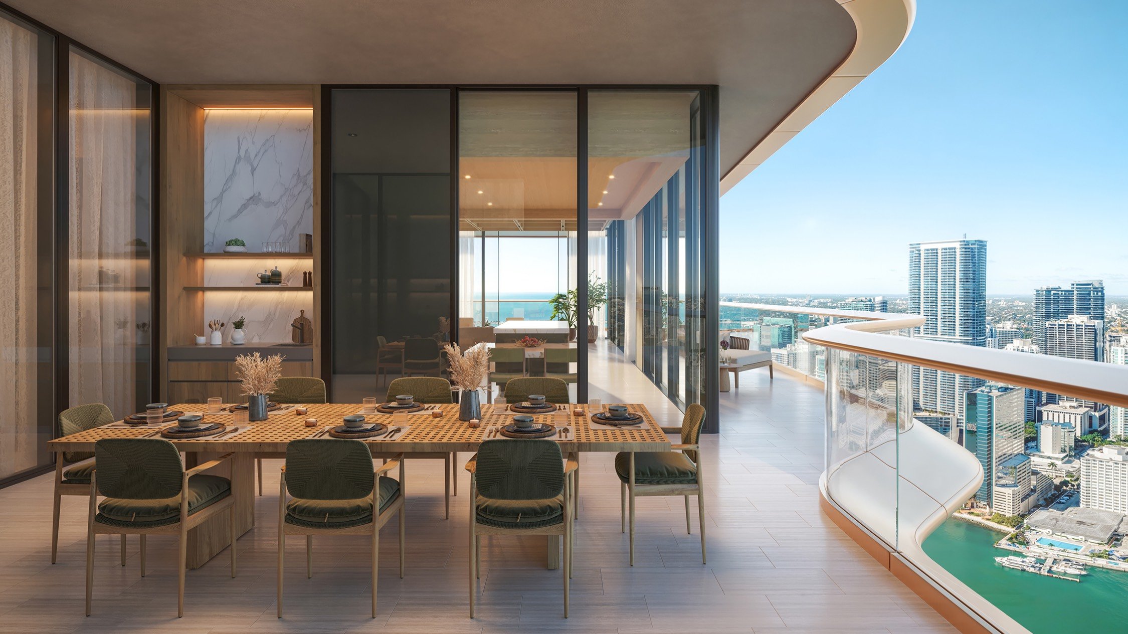 Dining room with sweeping city view at The Residences at Mandarin Oriental, Miami Tower Two; luxury interiors, ultra luxury preconstruction condos on the Miami waterfront. Featuring modern.