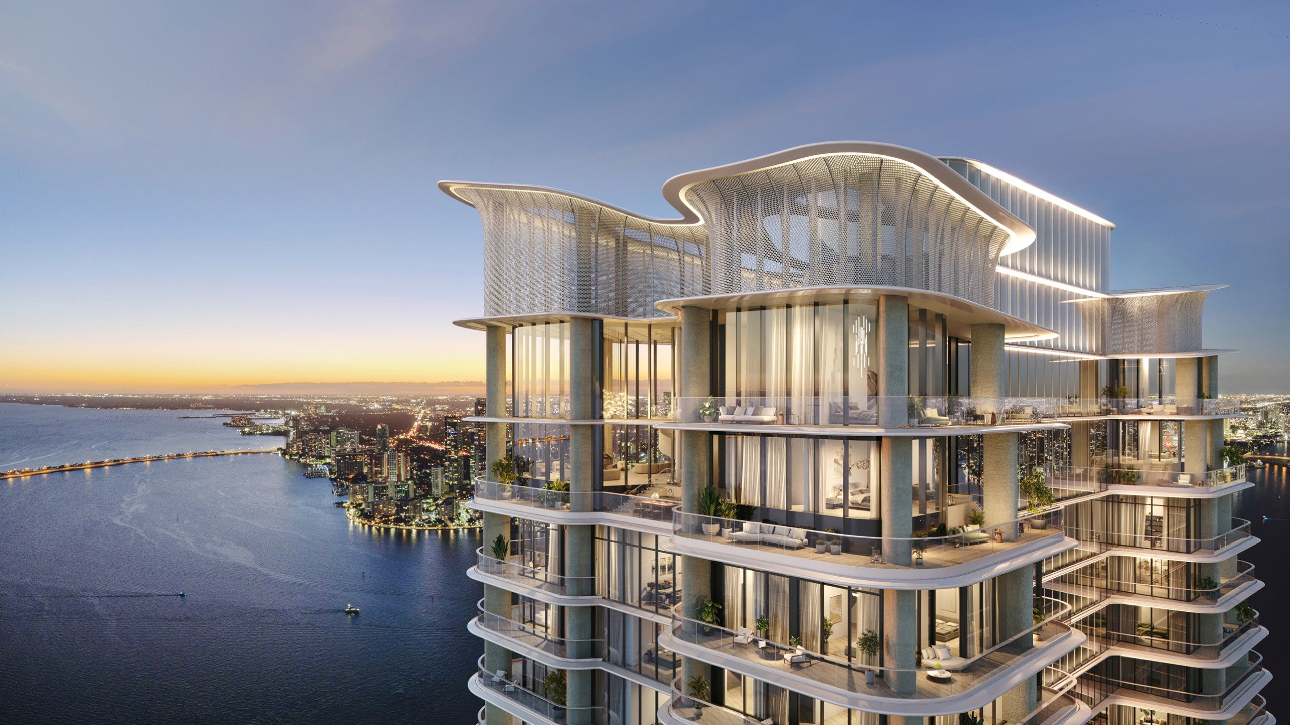 Waterfront high-rise at dusk, The Residences at Mandarin Oriental, Miami Tower Two on Brickell Key, ultra luxury condos in preconstruction with luxury bay and city views. Featuring modern and sunset.