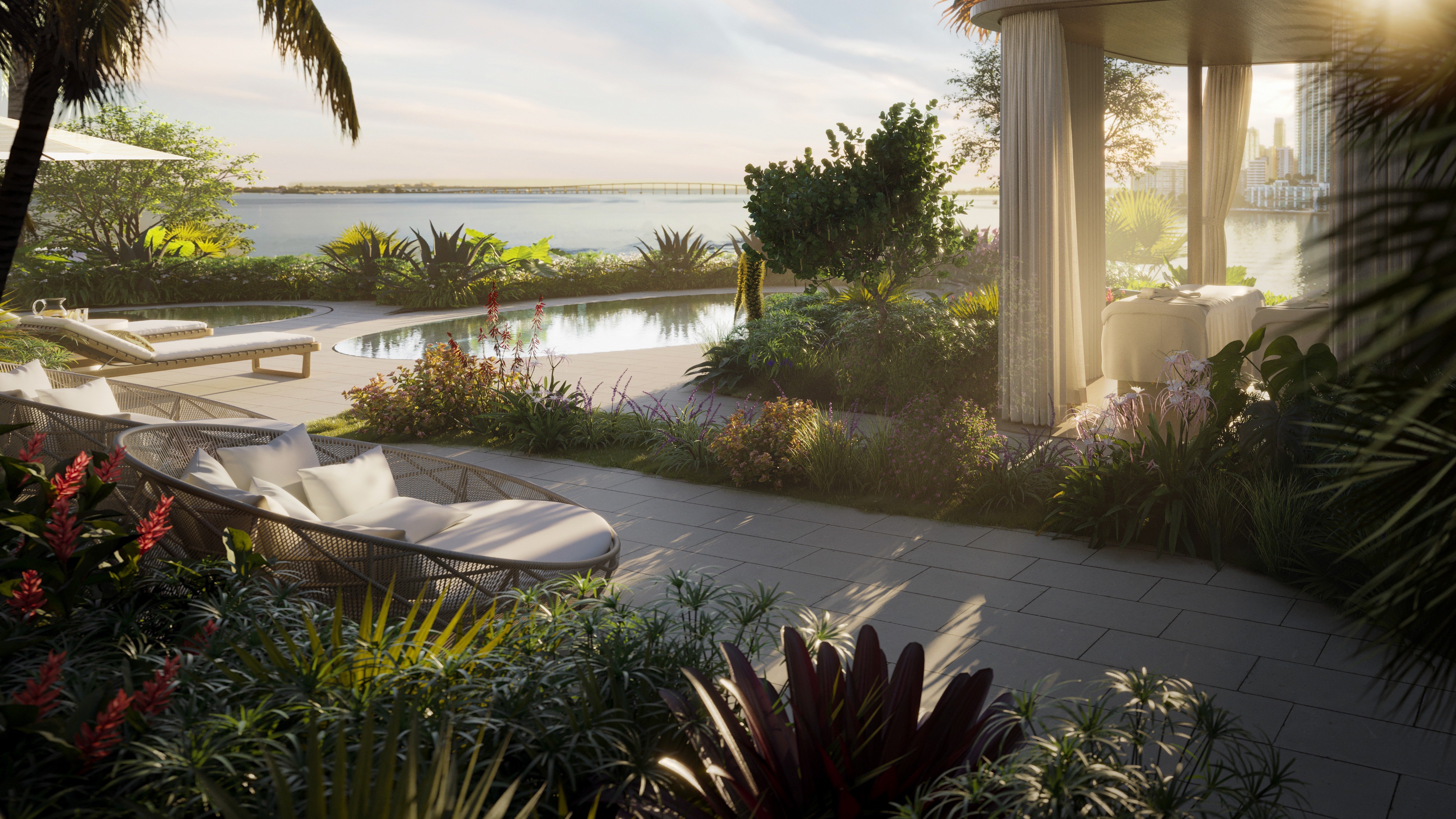 The Residences at Mandarin Oriental, Brickell Key Miami tropical patio at sunset by the pool, elevated living for luxury and ultra luxury condos; preconstruction. Featuring view.