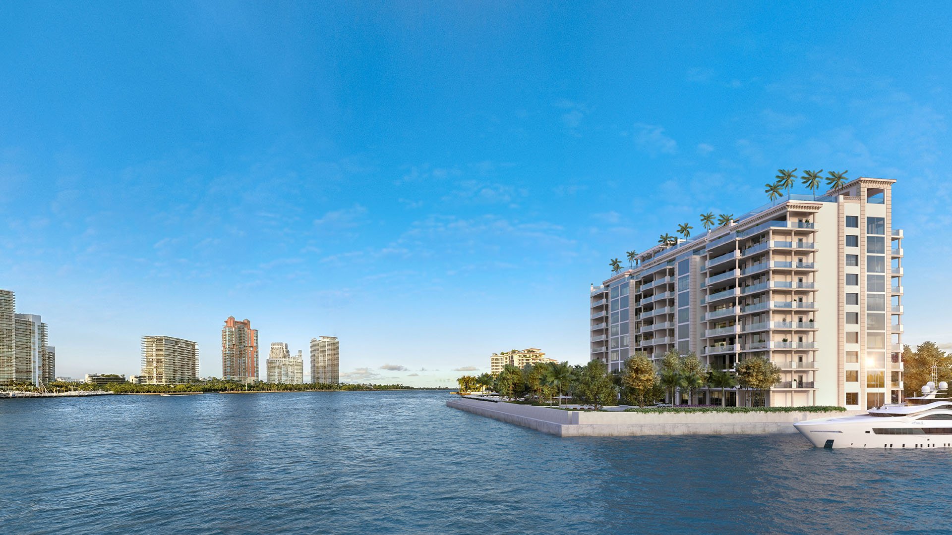 East elevation waterfront hero of The Residences at Six Fisher Island, Fisher Island Miami Beach, Florida, with private yacht at the dock and Miami skyline across the bay, presenting luxury and ultra luxury preconstruction condos.