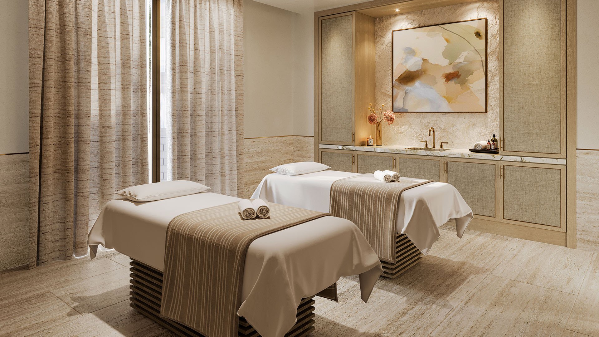 Spa treatment room with double massage tables at The Residences at Six Fisher Island, Fisher Island Miami Beach Florida; luxury and ultra luxury preconstruction condos offering serene wellness services.