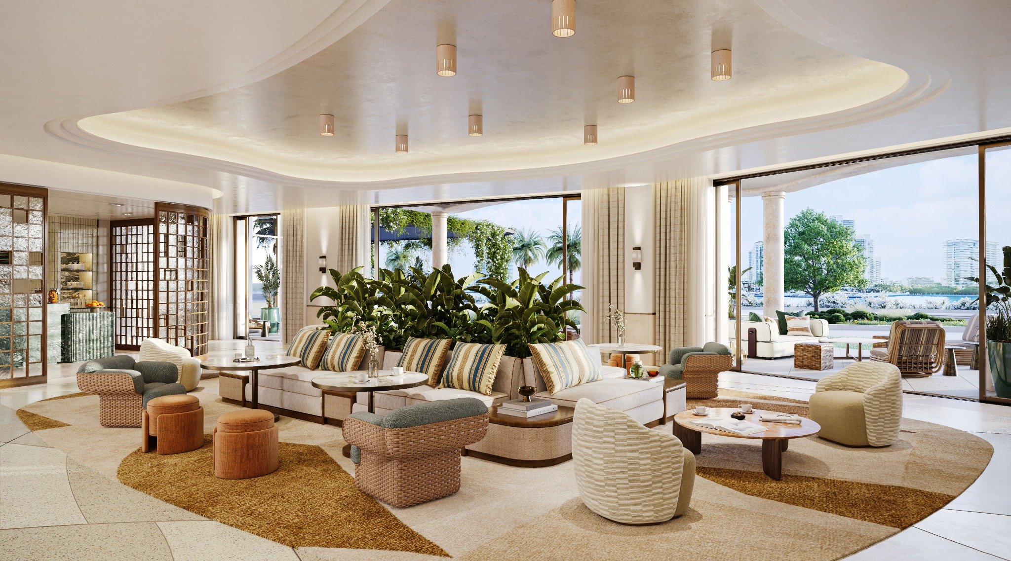 Waterfront gallery lounge at The Residences at Six Fisher Island, Fisher Island Miami Beach Florida, curved ceiling and designer seating opening to terrace; luxury and ultra luxury preconstruction condos social space.