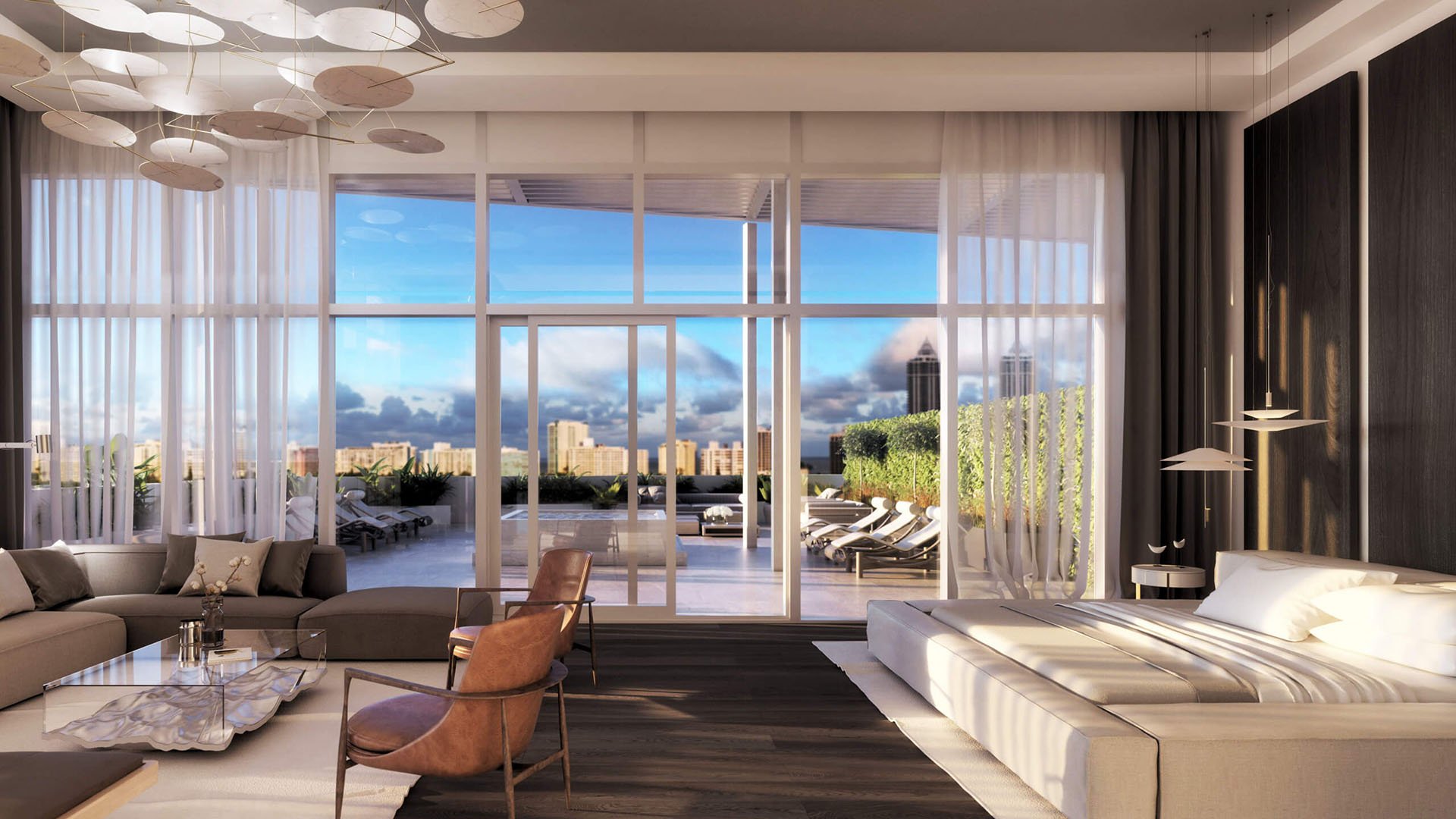 Primary suite with lounge seating, a private terrace and skyline views at The Ritz-Carlton Residences Miami Beach in Miami Beach, inside the luxury and ultra luxury condos.
