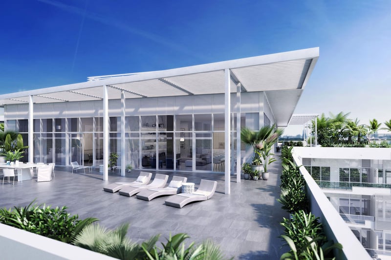 Rooftop sundeck pavilion with loungers, outdoor dining and lush planters at The Ritz-Carlton Residences Miami Beach in Miami Beach, an amenity for the luxury and ultra luxury condos.
