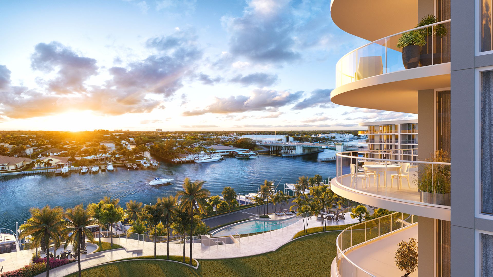 Balcony dining terrace at The Ritz-Carlton Residences Palm Beach Gardens, Palm Beach Gardens, Florida, with sunset views over the Intracoastal Waterway, bridge and marina, highlighting luxury and ultra luxury preconstruction condos.