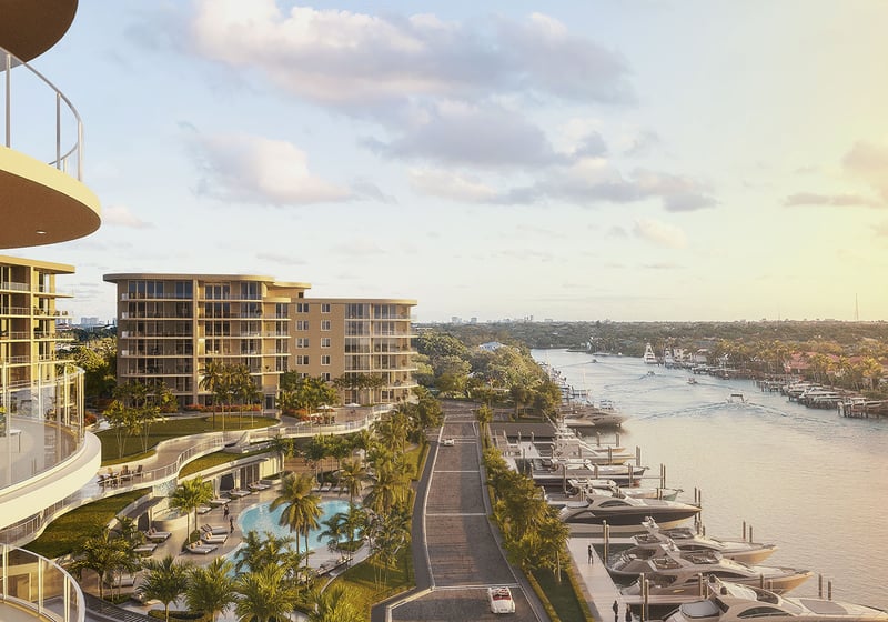 Curved glass balconies overlooking marina yacht slips at sunset at The Ritz-Carlton Residences Palm Beach Gardens, Palm Beach Gardens, Florida, showcasing luxury and ultra luxury preconstruction condos on the Intracoastal Waterway.