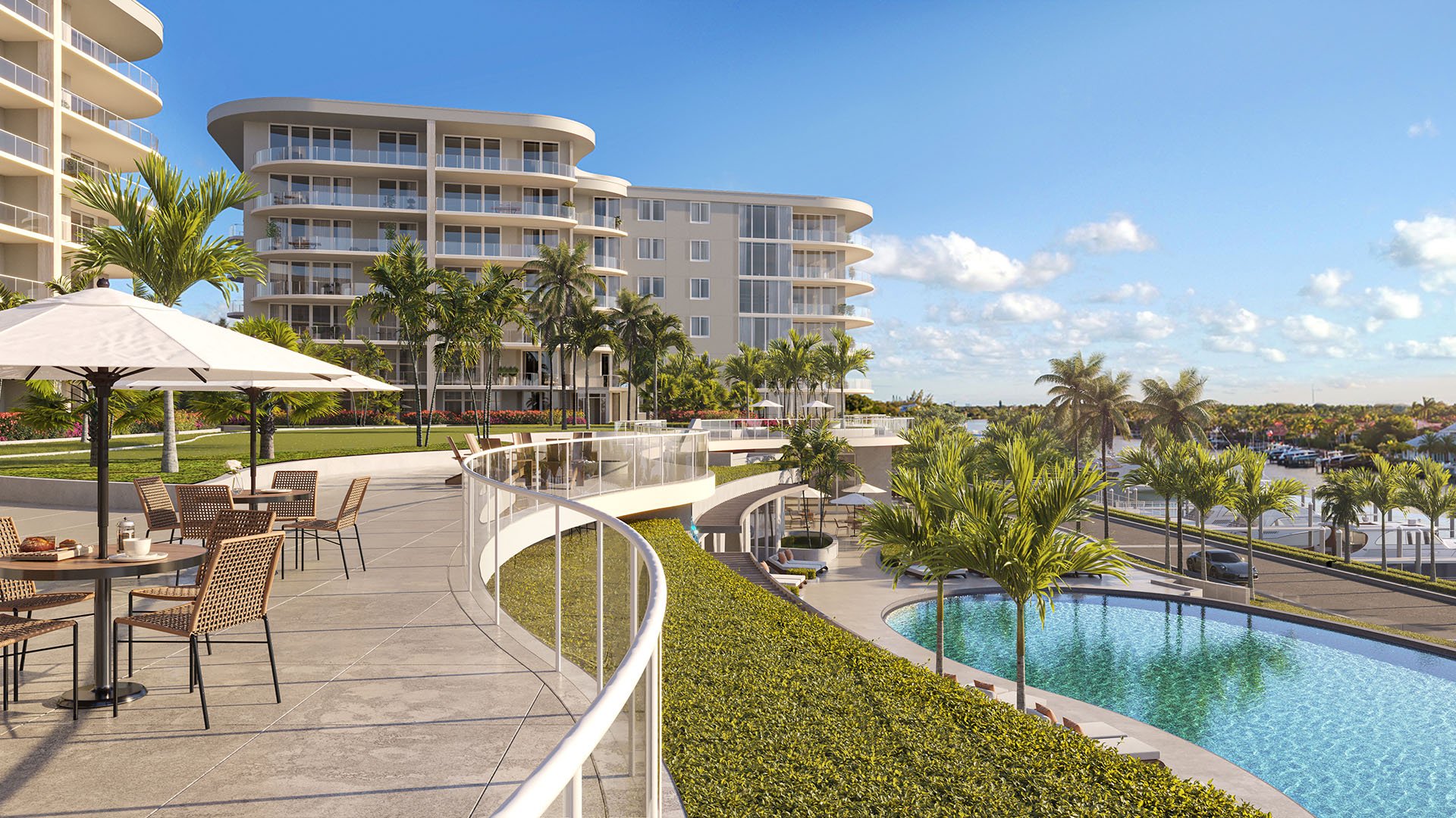 Garden terrace outdoor dining and café seating overlooking the resort pool and marina at The Ritz-Carlton Residences Palm Beach Gardens, Palm Beach Gardens, Florida, featuring luxury and ultra luxury preconstruction condos on the waterfront.