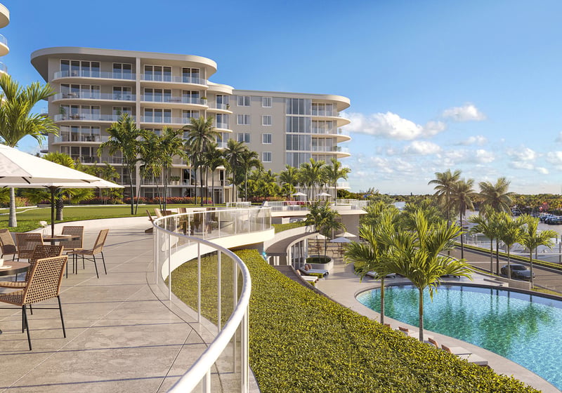 Garden terrace outdoor dining and café seating overlooking the resort pool and marina at The Ritz-Carlton Residences Palm Beach Gardens, Palm Beach Gardens, Florida, featuring luxury and ultra luxury preconstruction condos on the waterfront.