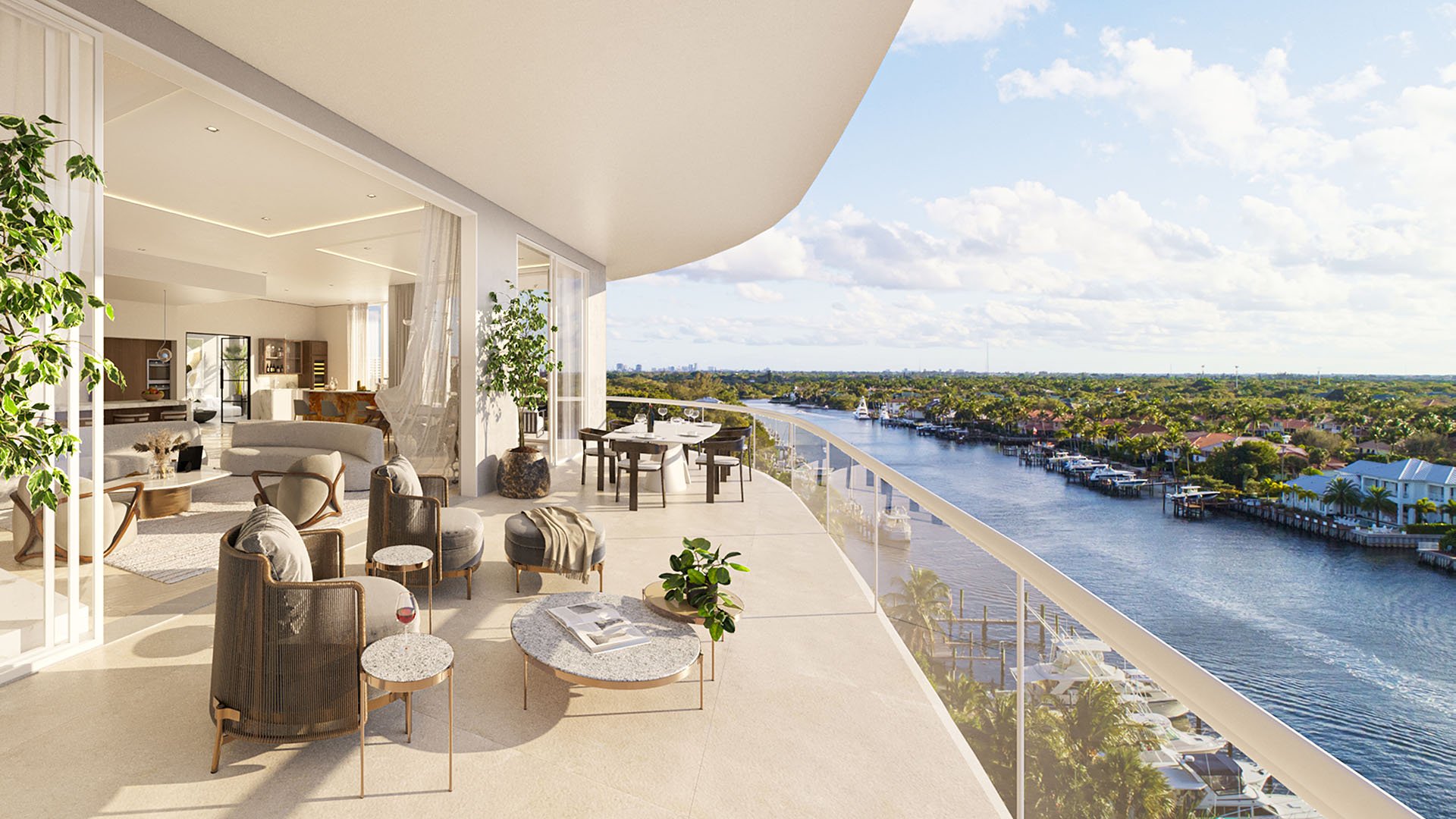 Residence A balcony outdoor living and dining at The Ritz-Carlton Residences Palm Beach Gardens, Palm Beach Gardens, Florida, with expansive Intracoastal Waterway and marina views, showcasing luxury and ultra luxury preconstruction condos.