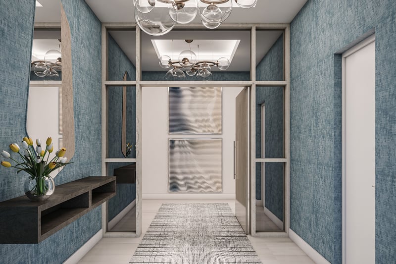 Residence C entry vestibule with blue textured walls, console table, mirror, art and glass globe chandelier at The Ritz-Carlton Residences, Palm Beach Gardens, Florida, highlighting luxury and ultra luxury preconstruction condos.