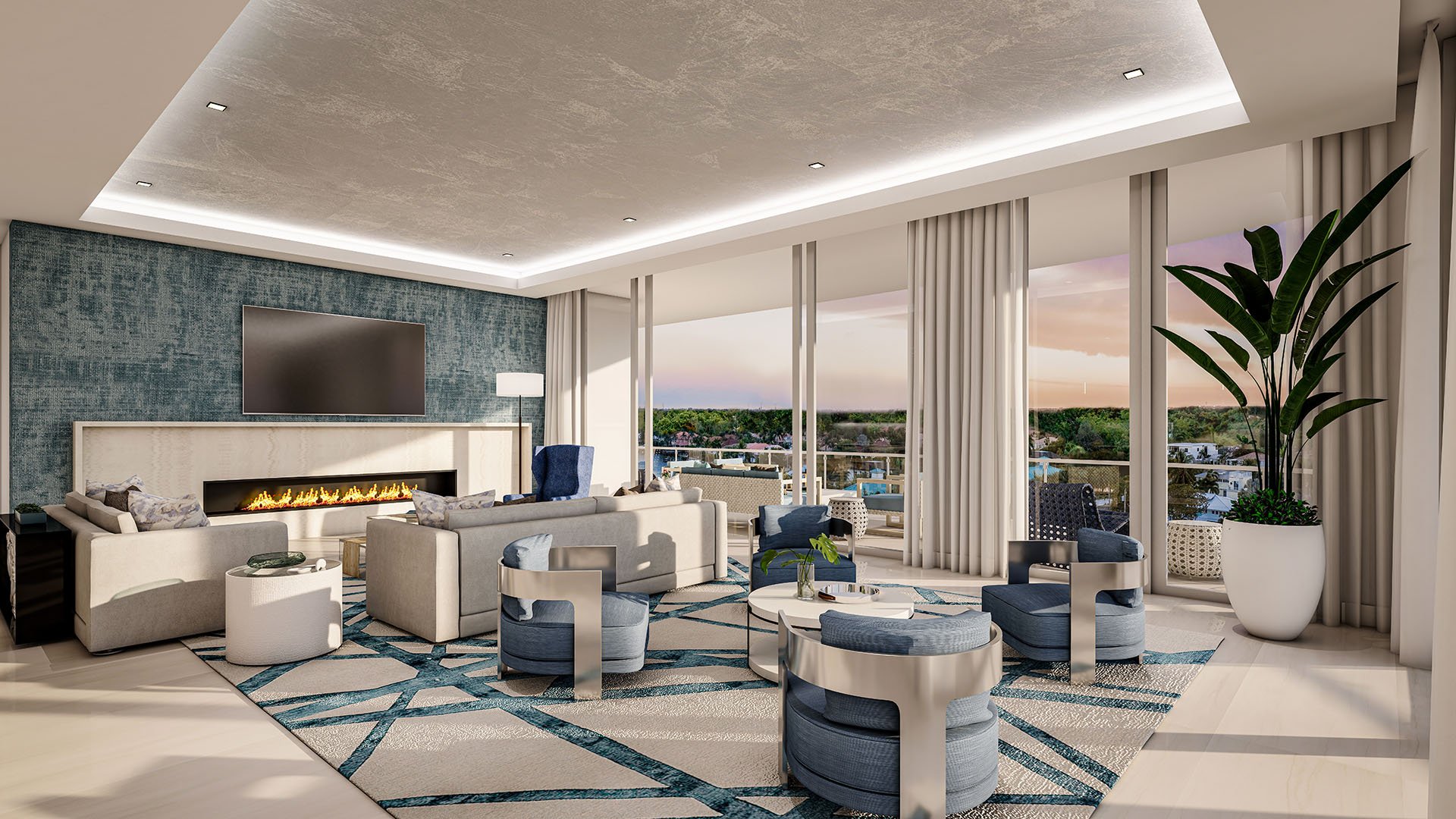Residence C great room with linear fireplace, wall-mounted TV, blue accent wall and floor-to-ceiling windows to balcony at The Ritz-Carlton Residences, Palm Beach Gardens, Florida, showcasing luxury and ultra luxury preconstruction condos.