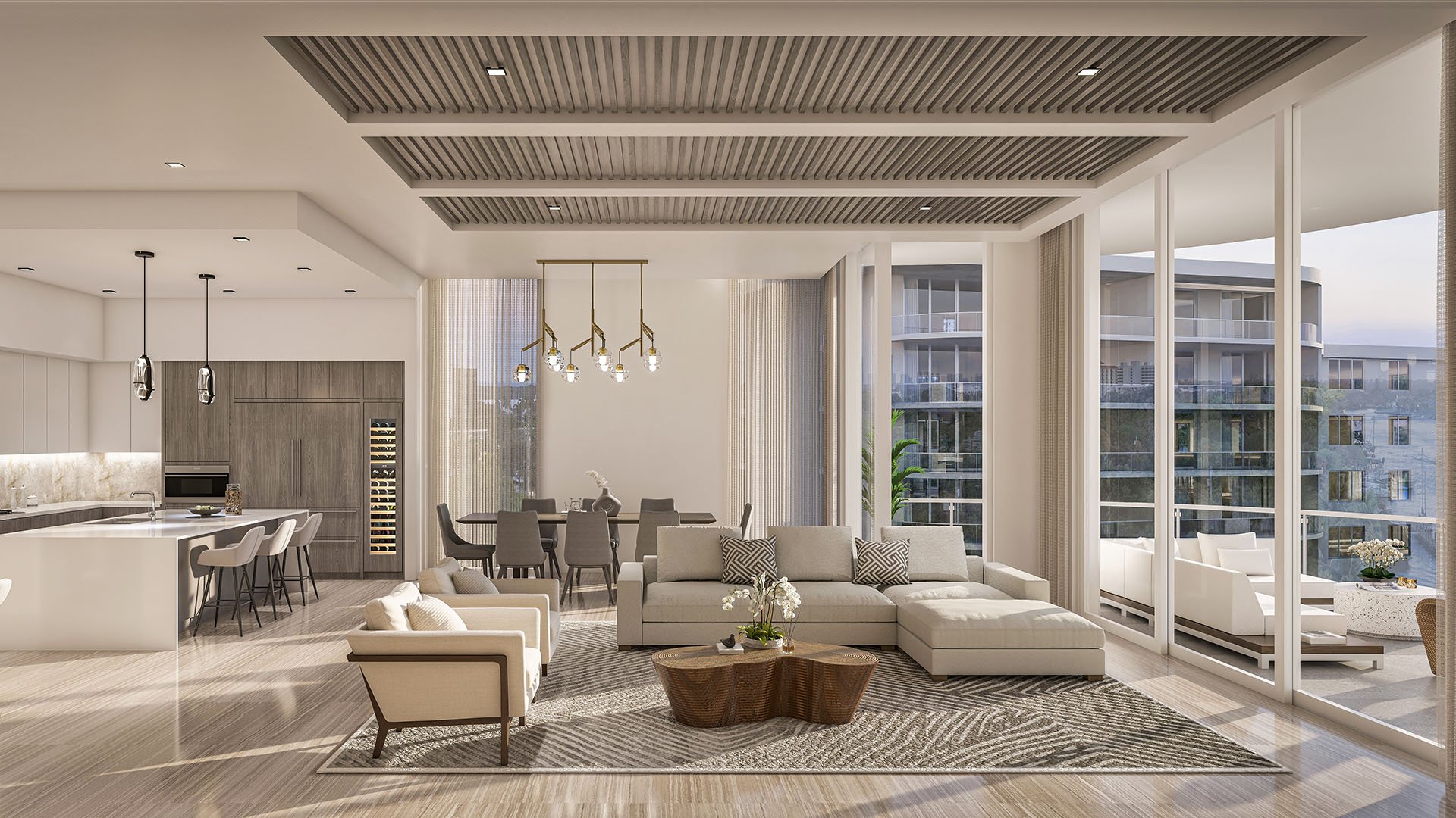 Residence F open-concept great room, kitchen and dining with slatted ceiling, marble island and sliding glass doors to balcony at The Ritz-Carlton Residences, Palm Beach Gardens, Florida, showcasing luxury and ultra luxury preconstruction condos.