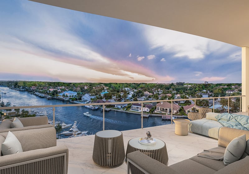 Residence G north building balcony with outdoor lounge seating and dramatic Intracoastal Waterway sunset view at The Ritz-Carlton Residences, Palm Beach Gardens, Florida, showcasing luxury and ultra luxury preconstruction condos.