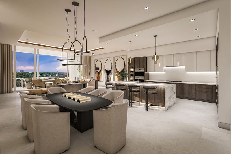 The Ritz-Carlton Residences, Palm Beach Gardens FL open-concept dining and chef kitchen with marble waterfall island and bar seating, showcasing luxury and ultra luxury preconstruction condos with floor-to-ceiling windows and terrace views.
