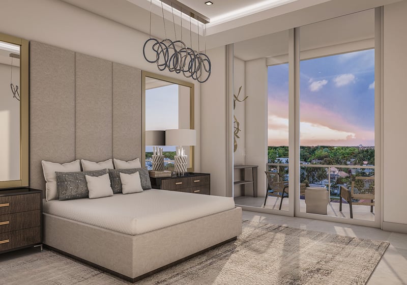 The Ritz-Carlton Residences, Palm Beach Gardens FL primary bedroom with balcony access, floor-to-ceiling windows and sunset skyline, curated furnishings for luxury and ultra luxury preconstruction condos waterfront living.