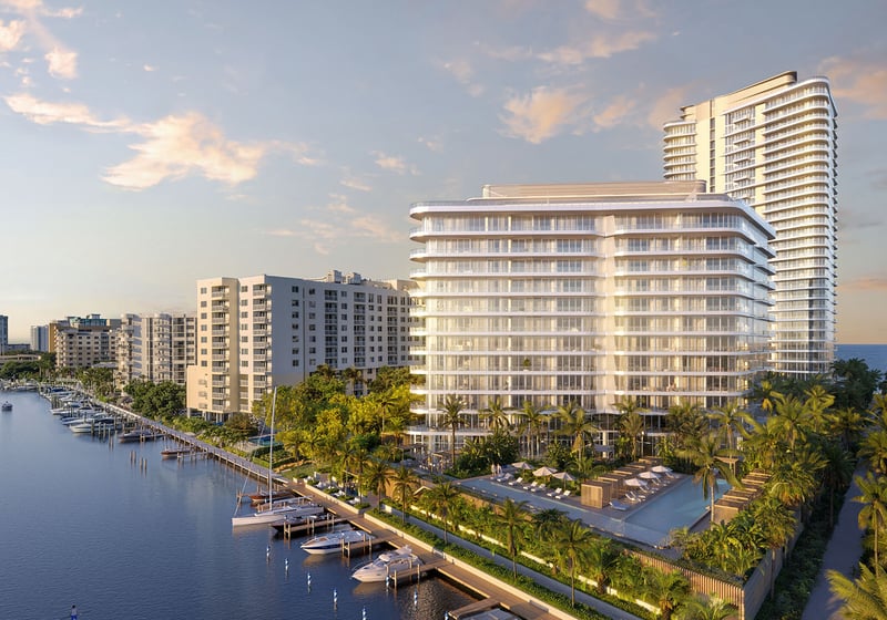 Aerial view of The Ritz-Carlton Residences Pompano Beach, Florida Marina Tower along the Intracoastal marina canal with ocean backdrop, showcasing luxury and ultra luxury preconstruction condos in a waterfront location.