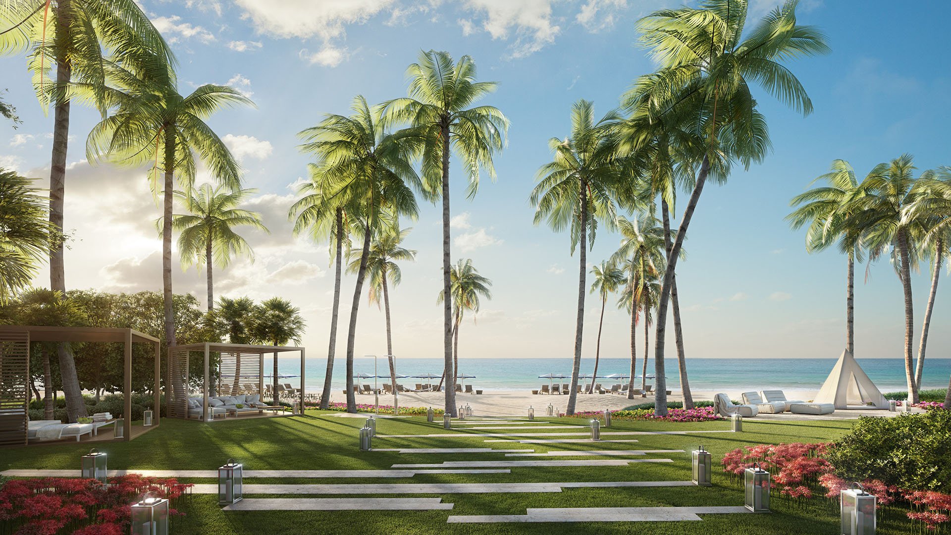 Palm-lined beachfront garden with pergola lounges and lawn paths at The Ritz-Carlton Residences, Sunny Isles Beach, luxury and ultra luxury condos in Sunny Isles Beach.