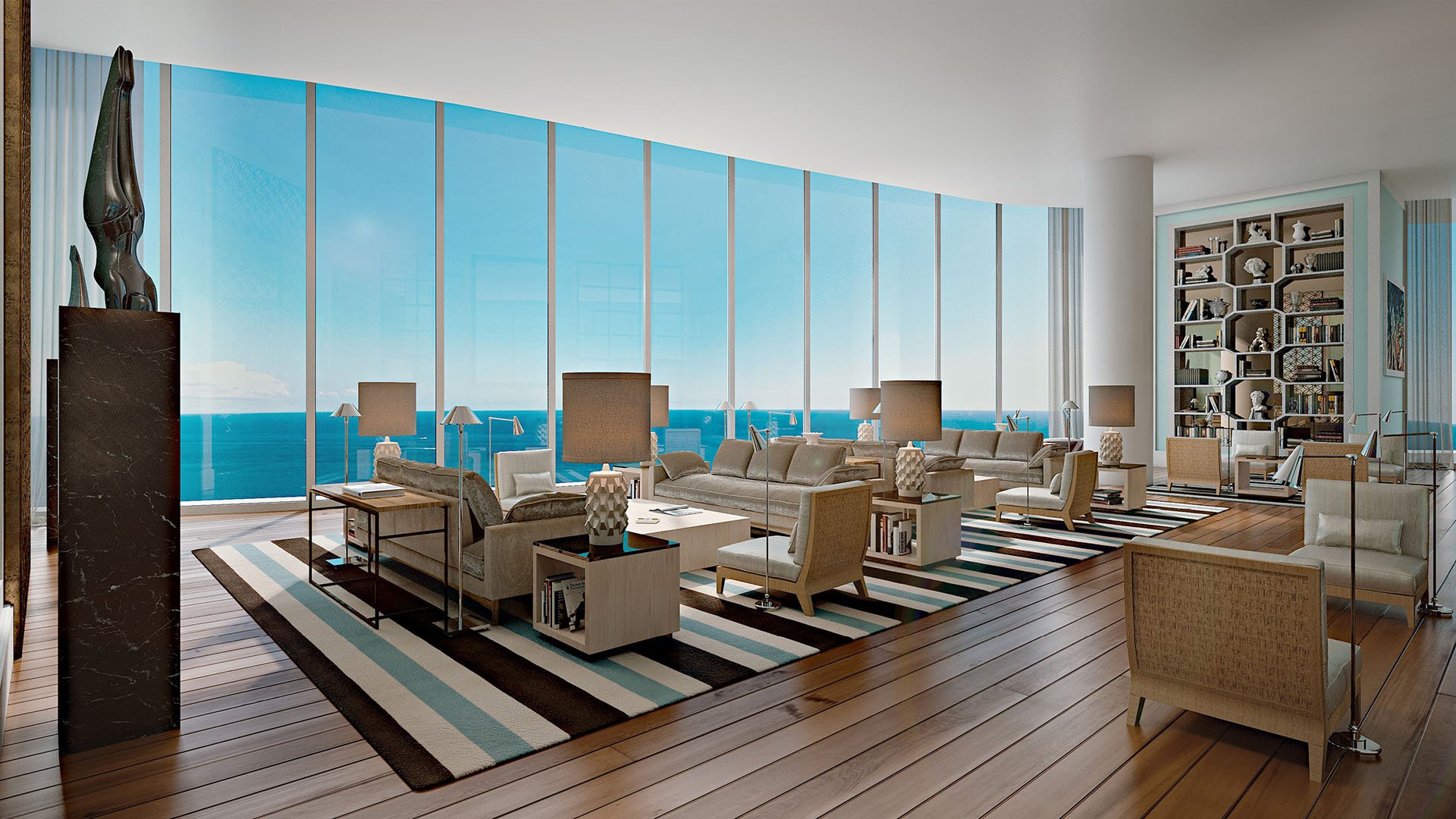 Club room lounge with library shelving and panoramic ocean views at The Ritz-Carlton Residences, Sunny Isles Beach, luxury and ultra luxury condos in Sunny Isles Beach.