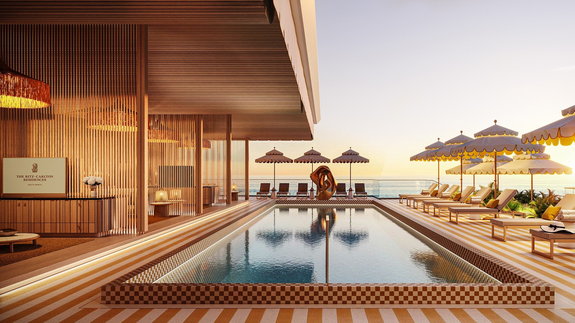 The Ritz‑Carlton South Beach pool at sunset, Miami Beach, resort ambiance surrounded by luxury and ultra luxury condos; resale.