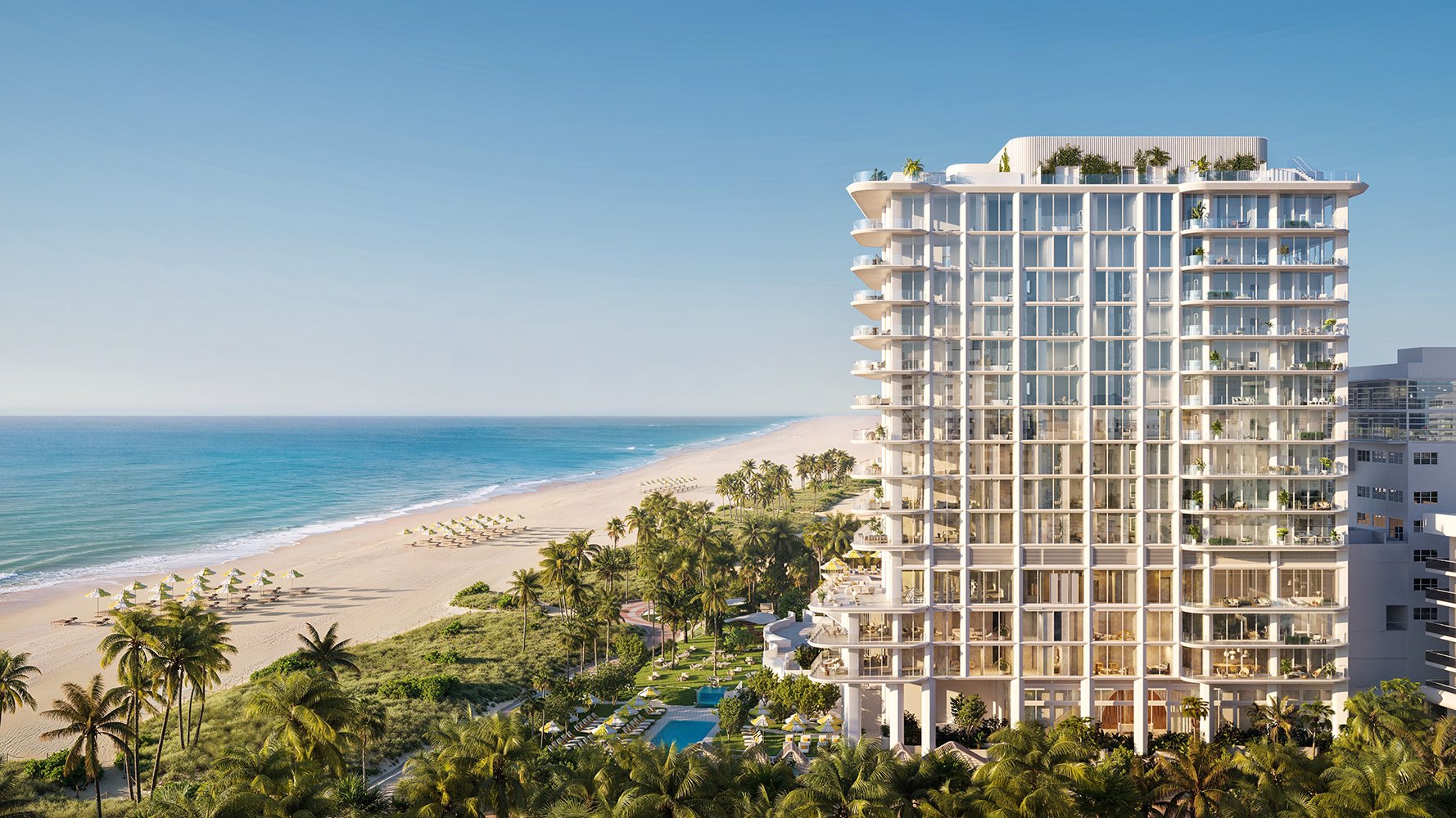 The Ritz‑Carlton South Beach beachfront hotel with palms, Miami Beach-central South Beach setting near luxury and ultra luxury condos; resale.
