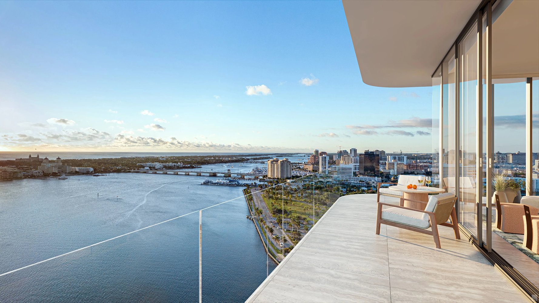 The Ritz‑Carlton West Palm Beach balcony city view at sunset—West Palm Beach; luxury and ultra luxury condos; preconstruction.