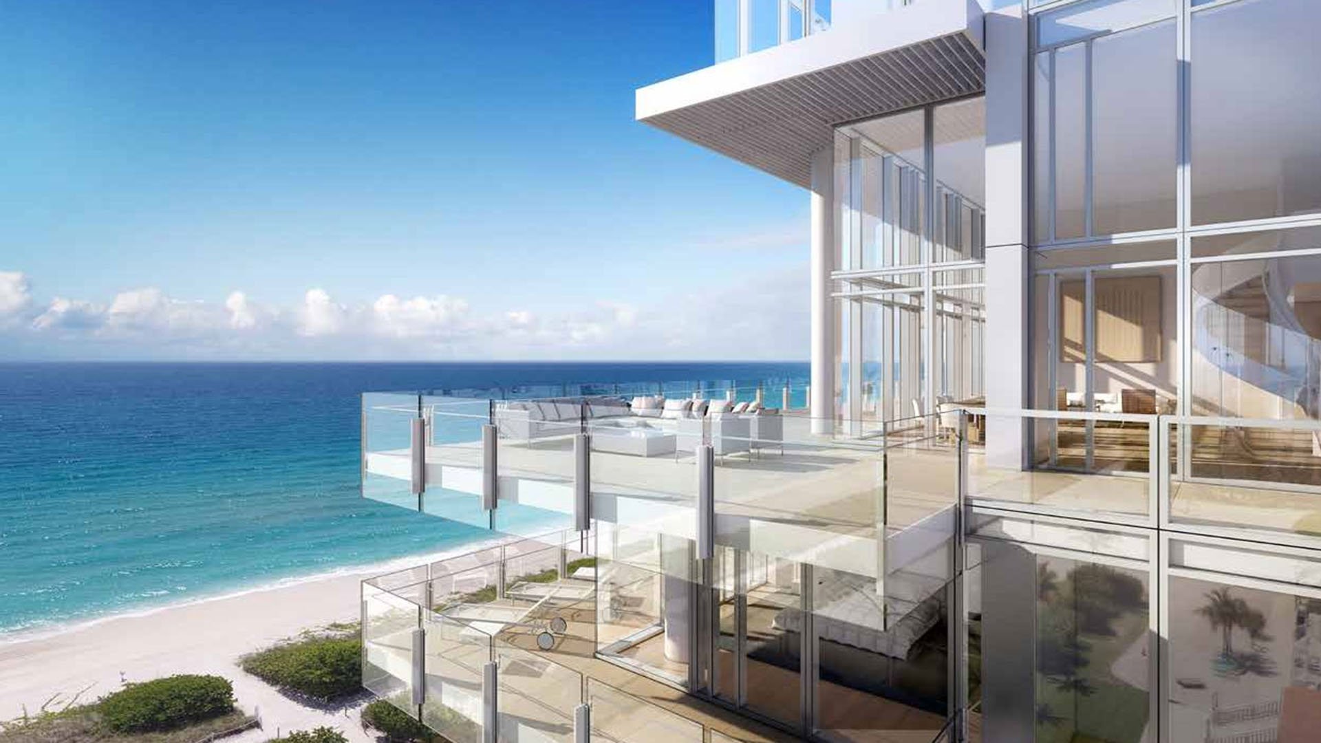 Beachfront glass corner terrace exterior with layered balconies and direct ocean backdrop at The Surf Club Four Seasons, Fort Lauderdale luxury and ultra luxury condos.