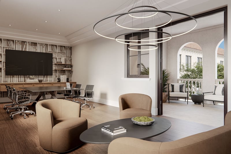 The Village at Coral Gables business center in Coral Gables, Miami featuring conference table, media screen and ring pendant lighting opening to an arched balcony lounge; luxury and ultra luxury preconstruction condos amenities.