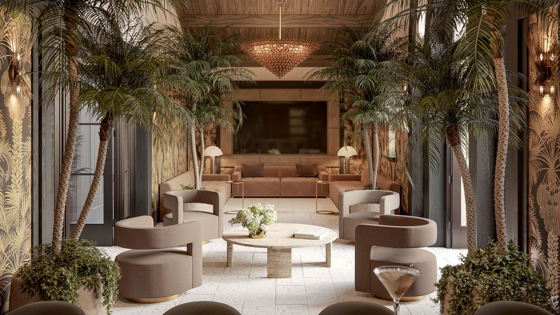 The Village at Coral Gables clubhouse lounge in Coral Gables, Miami with indoor palm trees, chandelier seating and large media wall; luxury and ultra luxury preconstruction condos lifestyle amenity.