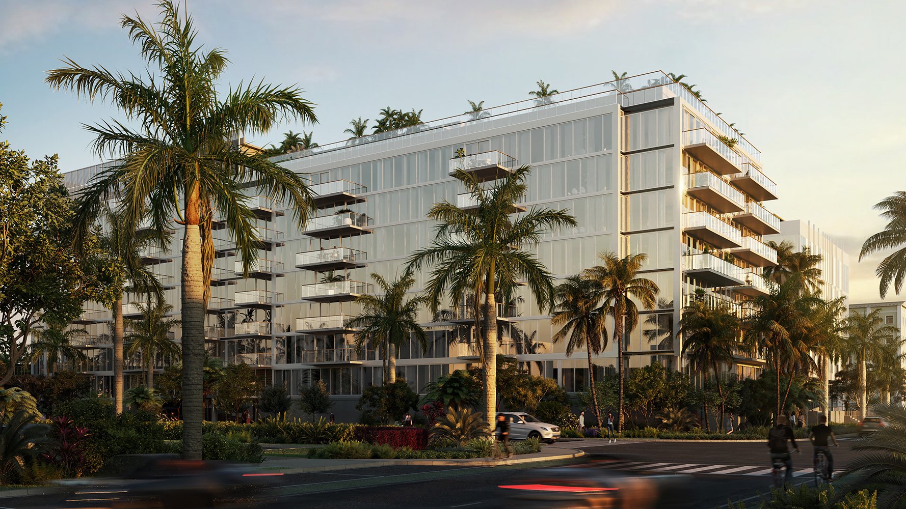 THE WELL Bay Harbor Islands modern apartment building with palms at sunset. Bay Harbor Islands, Miami; luxury and ultra luxury condos; preconstruction. Featuring palm trees.