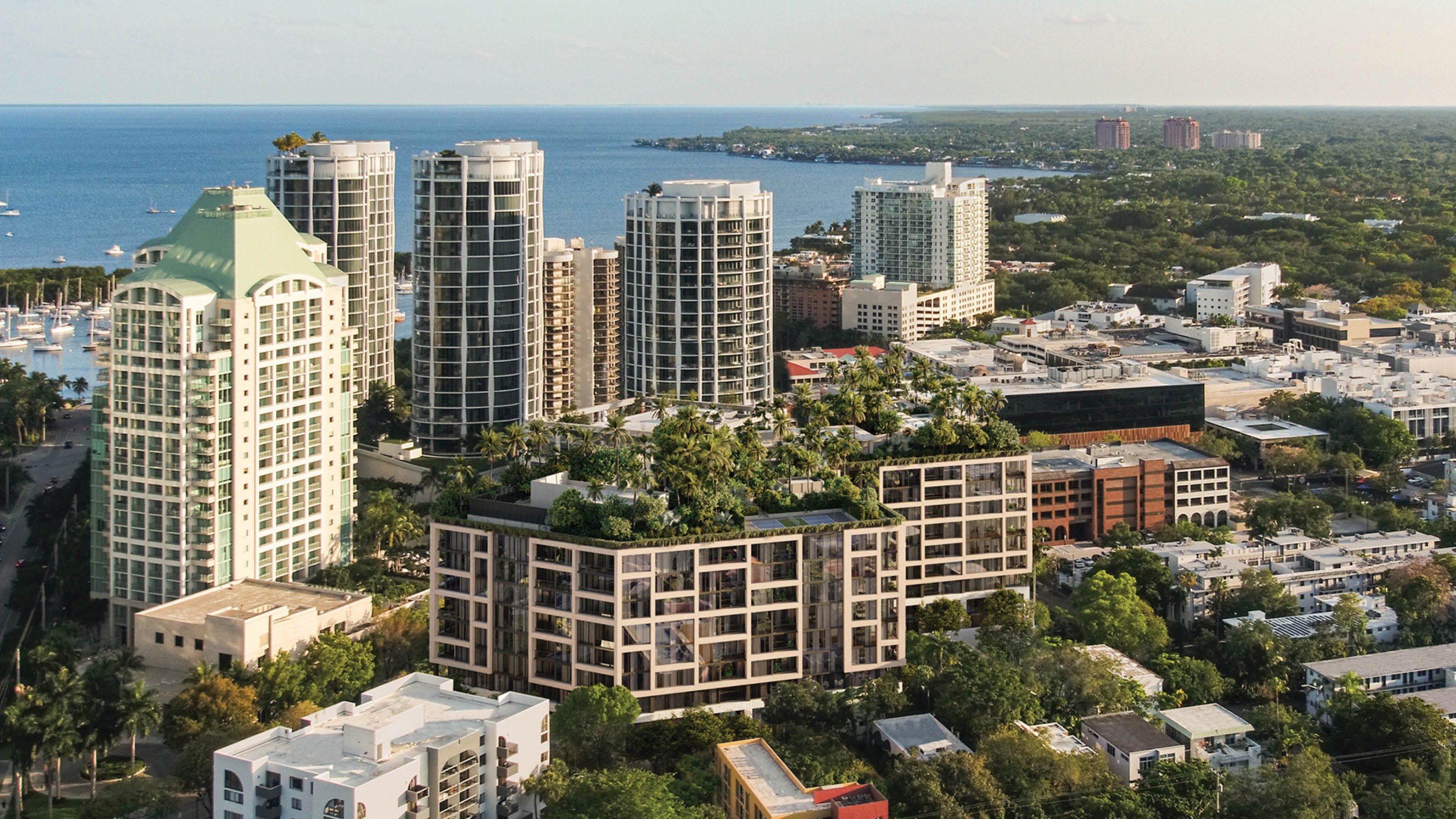 THE WELL Coconut Grove, Miami waterfront high‑rises and marinas, sought‑after area for luxury and ultra luxury condos; preconstruction. Featuring cityscape.