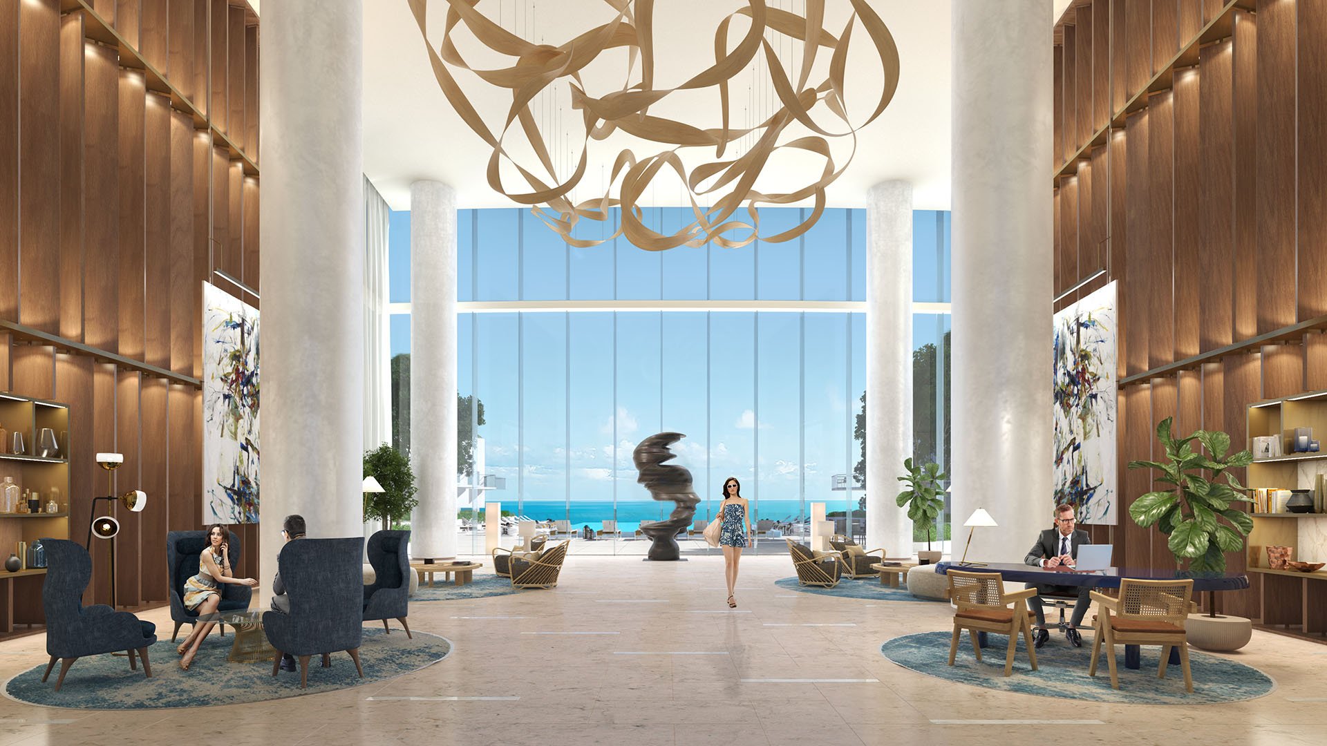 Turnberry Ocean Club in Sunny Isles Beach luxury and ultra luxury condos showcase a double-height lobby with warm wood walls, statement lighting, seating areas, and an ocean view.