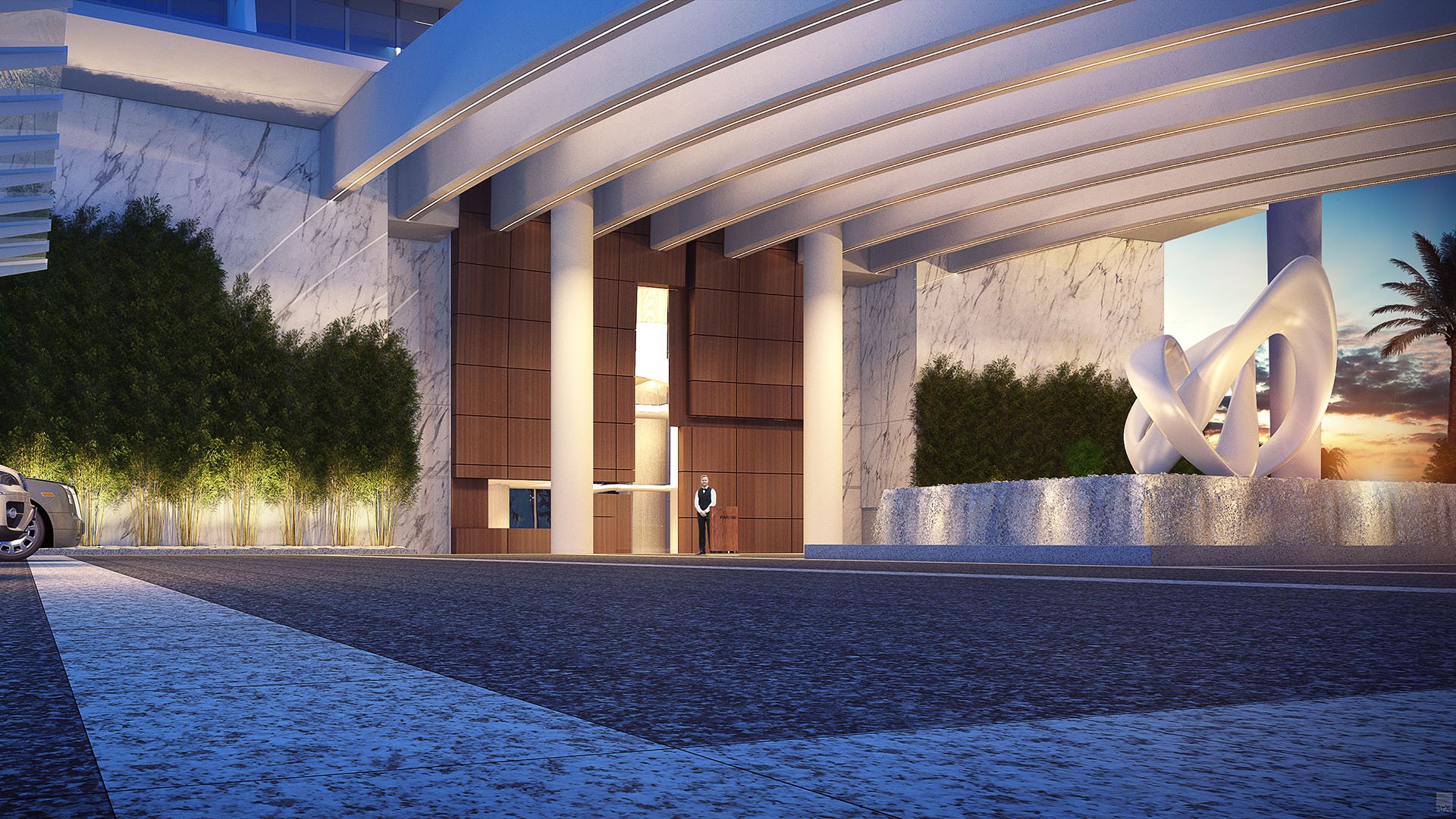 Turnberry Ocean Club in Sunny Isles Beach luxury and ultra luxury condos showcase a porte cochere arrival canopy with sculptural art, dramatic lighting, and a grand drop-off court.